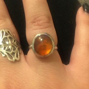Unmarked silver amber ring. Size 6.